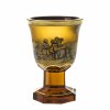 Pokal. Bersteinfarbenes Glas, geschliffen, Kuppa mit Schäferszene in Gold- und Schwarzlotmalerei. Best. H. 16,5 cm.