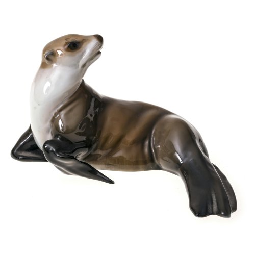 Seehund. Rosenthal. Porzellan, farbig staffiert. H. 7 cm.