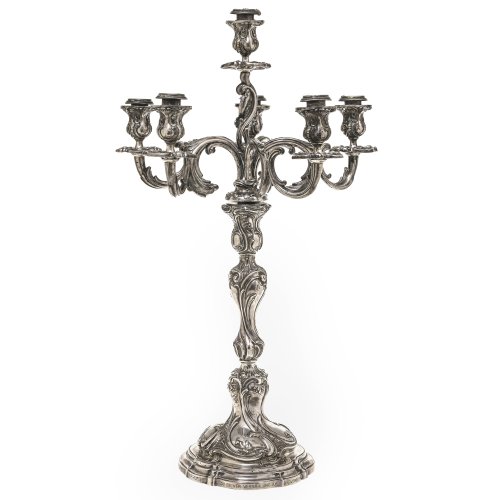 Girandole. Silber. Barockstil, 6-flammig. Mit Widmungsgravur. Gebrauchsspuren, leicht best. H. 60 cm.