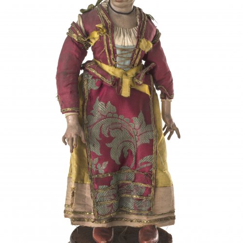 Krippenfigur. Bäuerin in Tracht. Neapel, 18. Jh. Glasaugen, originale Kleidung. H. 28 cm.