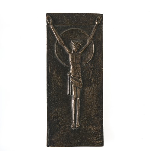 Reidel, Karl. Plakette, Bronze. Darstellung des Gekreuzigten. Seitl. sign. Ca. 13 x 5,6 cm.