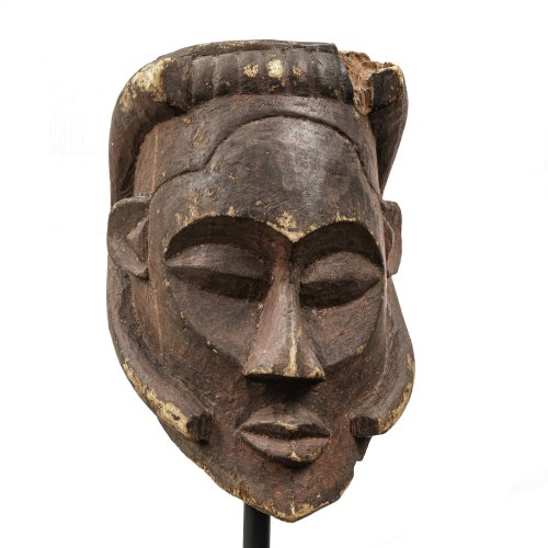 Helmmaske. Afrika. Holz. Gebrauchsspuren. H. 40 cm. Farbreste.