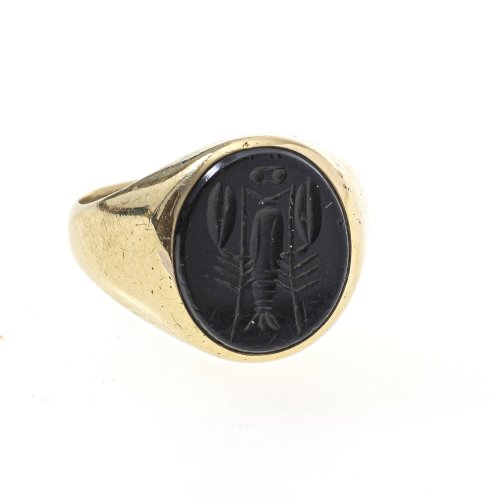 Siegelring. Onyx, mit Hummermotiv. Gold. Kratzspuren.