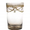 Becher. Farbloses Glas, Schliffdekor mit Gold.