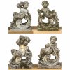 Vier Gartenskulpturen. Putti in der Darstellung der vier Jahreszeiten. Steinguss. H. je ca. 76 cm.